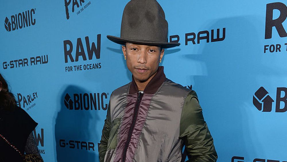NEW YORK, NY - FEBRUARY 08:  Recording Artist and Creative Director of Bionic Yarn Pharrell Williams attends the event to announce "RAW for the Oceans", a long-term collaboration between Bionic Yarn and G-Star turning ocean plastic into Denim, at American Museum of Natural History on February 8, 2014 in New York City.  (Photo by Dimitrios Kambouris/Getty Images for G-Star)