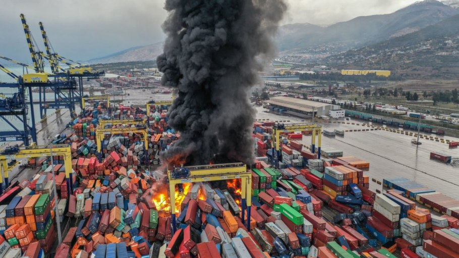 Smoke from a fire that broke out at the Port of Iskenderun among a heap of shipping containers that tumbled down at the terminal after two earthquakes rocked the region.