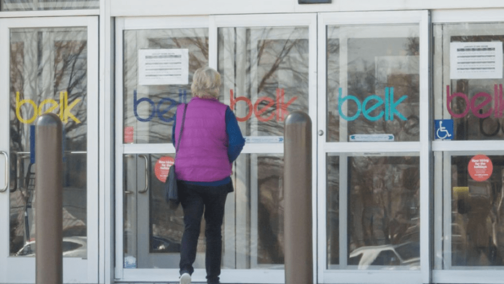 A WOMAN ENTERING A BELK DEPARTMENT STORE IN MCKINNEY, TEX., ON JAN. 28, 2021.