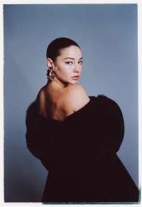 Adrienne Landau Quartz’s poly faux fur coat. Saint Laurent earrings.