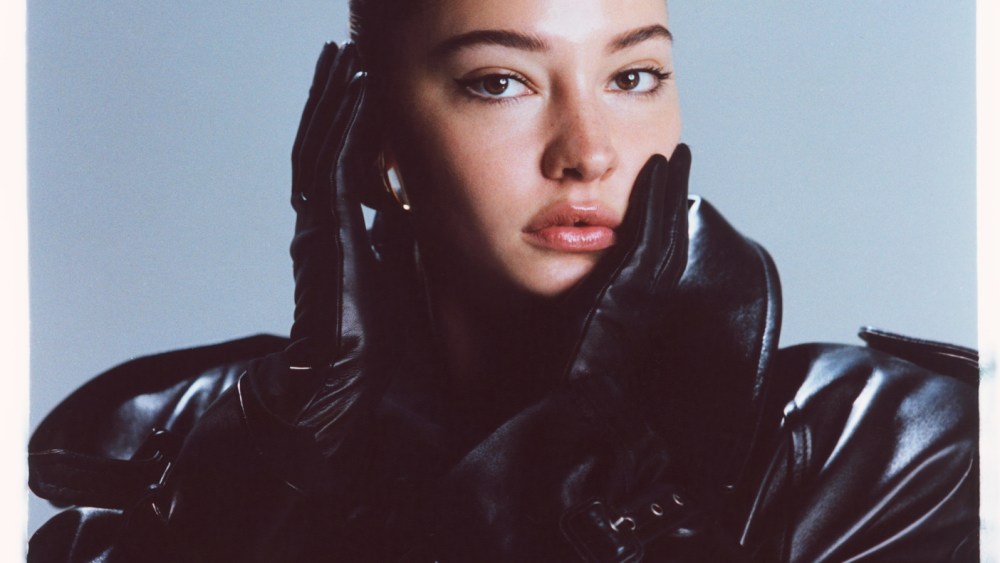 Saint Laurent’s lambskin coat and earrings. Givenchy gloves.