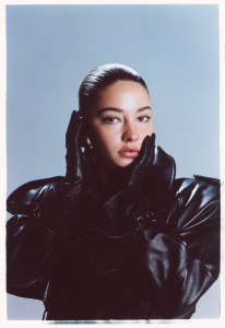 Saint Laurent’s lambskin coat and Khaite earrings. Givenchy gloves.