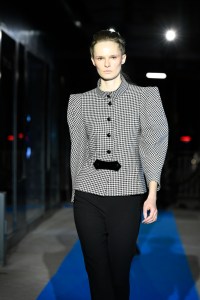 Model on the runway at Pierre Cardin Fall 2023 Ready To Wear Fashion Show on March 5, 2023 at the Pierre Cardin Headquarters in Paris, France.