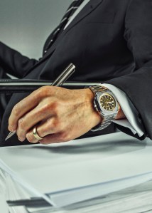 Bell & Ross’ BR 05 Skeleton Golden, 40-mm wide,10.33-mm thick, satin-finished and polished steel case with transparent panel and rhodium-plated dial. Celine blazer; Paul Stuart shirt; Ralph Lauren Purple Label tie.