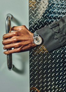 Frederique Constant’s Classics Heart Beat Manufacture with FC-930-3 caliber, automatic, polished stainless steel case and white lacquered dial. Burberry trenchcoat.