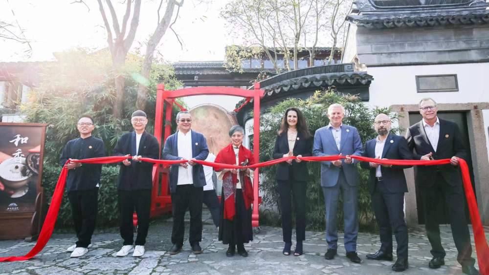 The ribbon cutting ceremony at the opening of Villa Harmony in Shanghai, China.