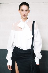 Backstage at Sacai RTW Fall 2023