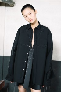 Backstage at Sacai RTW Fall 2023
