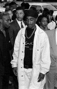 Tupac Shakur in a Karl Kani denim suit and t-shirt attends the premiere of "Poetic Justice" at the headquarters of the Academy of Motion Picture Arts and Sciences in Beverly Hills, 1993.