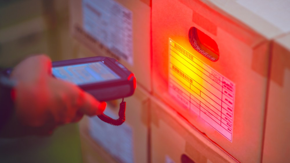 Handheld scanning barcode to inventory in a warehouse.
