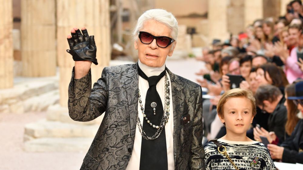 PARIS, FRANCE - MAY 03:  Designer Karl Lagerfeld and nephew Hudson Kroenig walk the runway during Chanel Cruise 2017/2018 Collection at Grand Palais on May 3, 2017 in Paris, France.  (Photo by Pascal Le Segretain/Getty Images)