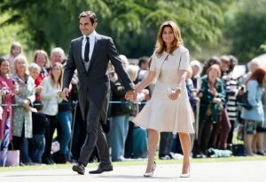 ENGLEFIELD, ENGLAND - MAY 20:  Swiss tennis player Roger Federer and his wife Mirka arrive at St Mark's Church ahead of the wedding of Pippa Middleton and James Matthews on May 20, 2017 in Englefield, England. Middleton, the sister of Catherine, Duchess of Cambridge is to marry hedge fund manager James Matthews in a ceremony Saturday where her niece and nephew Prince George and Princess Charlotte are in the wedding party, along with sister Kate and princes Harry and William. (Photo by Kirsty Wigglesworth - Pool/Getty Images)