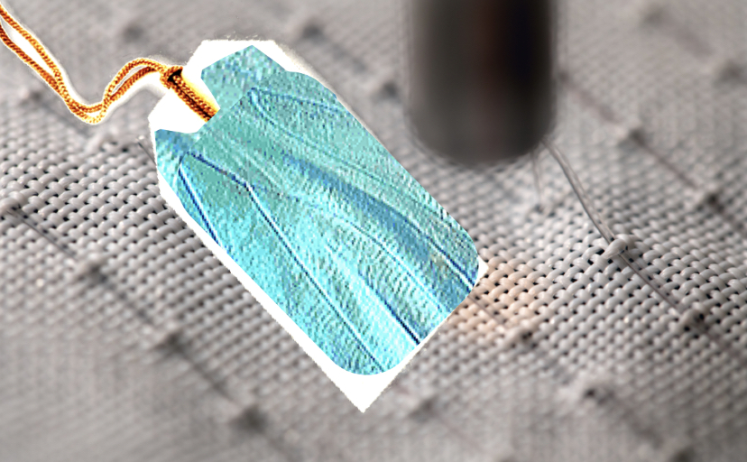 A closeup of Brian lezzi doing a scan and measurement of photonic fibers in a fabric he developed. Collaged with a label and butterfly swatch which mimics the technology.