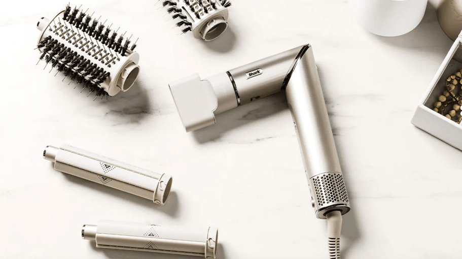 Shark hair dryer and styling attachments placed on marble counter