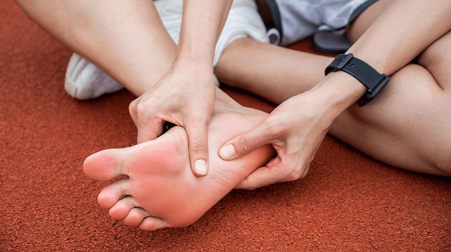 Cropped shot view of female runner suffering from injury.