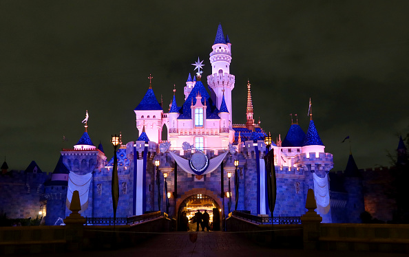 ANAHEIM, CA - APRIL 13: People walk in front of the Sleeping Beauty Castle at the Disneyland theme park on April 13, 2023, in Anaheim, California. (Photo by Gary Hershorn/Getty Images)