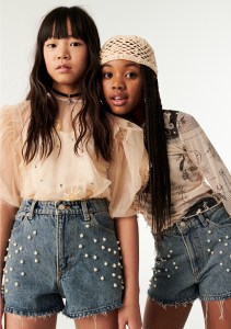 The girls' collection features denim embellished with recycled pearls and rhinestones.