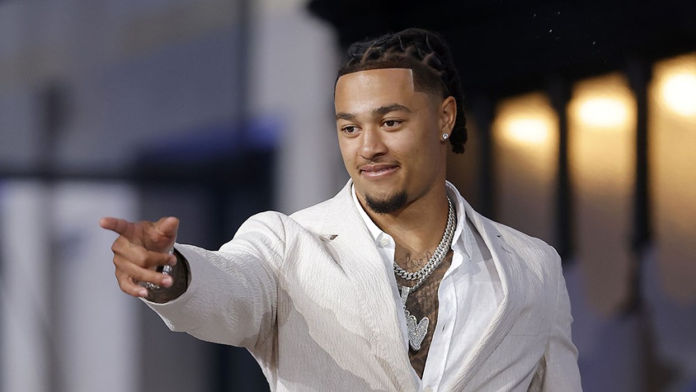 KANSAS CITY, MISSOURI - APRIL 27: Top prospect Jaxon Smith-Njigba is introduced during the first round of the 2023 NFL Draft at Union Station on April 27, 2023 in Kansas City, Missouri. (Photo by David Eulitt/Getty Images)