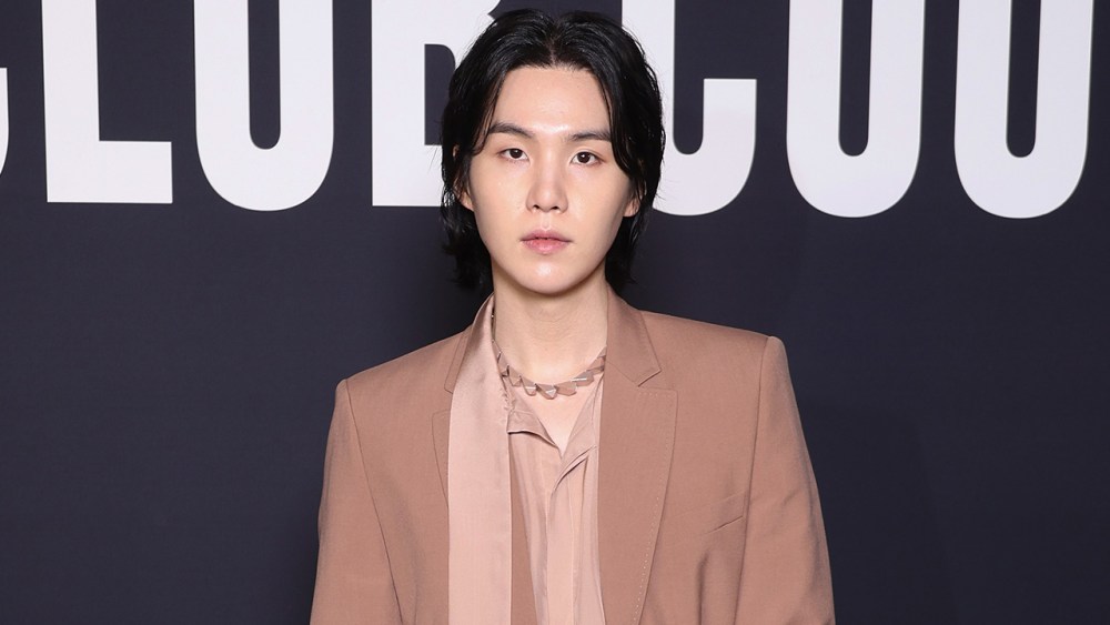 PARIS, FRANCE - JANUARY 25: (EDITORIAL USE ONLY - For Non-Editorial use please seek approval from Fashion House) Suga attends the Valentino Haute Couture Spring Summer 2023 show as part of Paris Fashion Week  on January 25, 2023 in Paris, France. (Photo by Pascal Le Segretain/Getty Images)