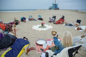The scene at the Sacred Woman Collective sunset circle in Santa Monica, California.