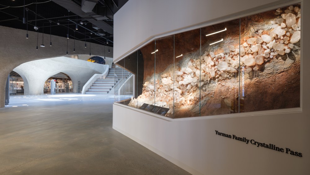 Wide shot of Kenneth C. Griffin Exploration with David Yurman Crystalline Pass in foreground. Entrance to Gilder Center from Halls of Gems and Minerals.