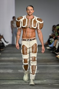 SYDNEY, AUSTRALIA - MAY 17: A model walks the runway in a design by Donovan Darling during The Innovators: Fashion Design Studio TAFE NSW show during Afterpay Australian Fashion Week 2023  at Carriageworks on May 17, 2023 in Sydney, Australia. (Photo by Stefan Gosatti/Getty Images for AAFW)
