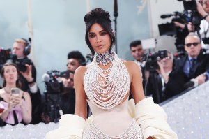 Kim Kardashian wears hair by Chris Appleton, and makeup by Mario Dedivanovic.
