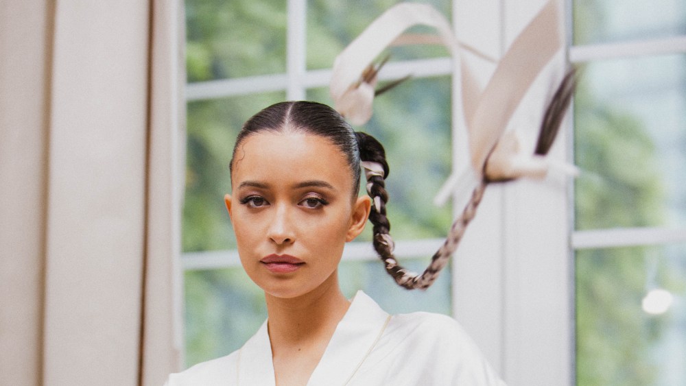 Christian Serratos gets ready for the Dior Cruise show in Mexico City.