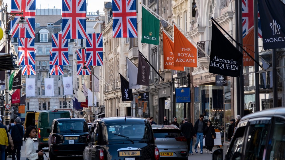 Union Flags hanging along Bond Street in celebration for the forthcoming  Coronation of King Charles III.