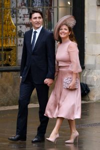 Canadian Prime Minister Justin Trudeau and his wife Sophie arrive at Westminster Abbey in central London on May 6, 2023, ahead of the coronations of Britain's King Charles III and Britain's Camilla, Queen Consort. - The set-piece coronation is the first in Britain in 70 years, and only the second in history to be televised. Charles will be the 40th reigning monarch to be crowned at the central London church since King William I in 1066. Outside the UK, he is also king of 14 other Commonwealth countries, including Australia, Canada and New Zealand. Camilla, his second wife, will be crowned queen alongside him, and be known as Queen Camilla after the ceremony. (Photo by Odd ANDERSEN / AFP) (Photo by ODD ANDERSEN/AFP via Getty Images)