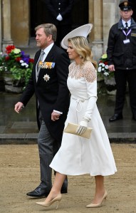 LONDON, ENGLAND - MAY 06: King Willem-Alexander of the Netherlands and Queen Maxima arrive to attend the Coronation of King Charles III and Queen Camilla on May 6, 2023 in London, England. The Coronation of Charles III and his wife, Camilla, as King and Queen of the United Kingdom of Great Britain and Northern Ireland, and the other Commonwealth realms takes place at Westminster Abbey today. Charles acceded to the throne on 8 September 2022, upon the death of his mother, Elizabeth II. (Photo by Toby Melville - WPA Pool/Getty Images)