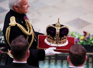 LONDON, ENGLAND - MAY 06: 17th Century St Edward's Crown arrives for the Coronation of King Charles III and Queen Camilla on May 6, 2023 in London, England. The Coronation of Charles III and his wife, Camilla, as King and Queen of the United Kingdom of Great Britain and Northern Ireland, and the other Commonwealth realms takes place at Westminster Abbey today. Charles acceded to the throne on 8 September 2022, upon the death of his mother, Elizabeth II. (Photo by Phil Noble - WPA Pool/Getty Images)