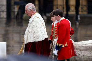 Britain's King Charles III enters Westminster Abbey through the Great West Door, in central London on May 6, 2023, ahead of his coronation. - The set-piece coronation is the first in Britain in 70 years, and only the second in history to be televised. Charles will be the 40th reigning monarch to be crowned at the central London church since King William I in 1066. Outside the UK, he is also king of 14 other Commonwealth countries, including Australia, Canada and New Zealand. Camilla, his second wife, will be crowned queen alongside him and be known as Queen Camilla after the ceremony. (Photo by Odd ANDERSEN / AFP) (Photo by ODD ANDERSEN/AFP via Getty Images)