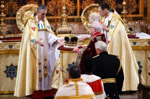 LONDON, ENGLAND - MAY 06: St Edward's Crown is placed during the Coronation of King Charles III and Queen Camilla on May 6, 2023 in London, England. The Coronation of Charles III and his wife, Camilla, as King and Queen of the United Kingdom of Great Britain and Northern Ireland, and the other Commonwealth realms takes place at Westminster Abbey today. Charles acceded to the throne on 8 September 2022, upon the death of his mother, Elizabeth II. (Photo by Yui Mok - WPA Pool/Getty Images)