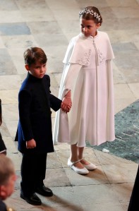 Britain's Princess Charlotte of Wales and Britain's Prince Louis of Wales arrive at Westminster Abbey in central London on May 6, 2023, ahead of the coronations of Britain's King Charles III and Britain's Camilla, Queen Consort. - The set-piece coronation is the first in Britain in 70 years, and only the second in history to be televised. Charles will be the 40th reigning monarch to be crowned at the central London church since King William I in 1066. Outside the UK, he is also king of 14 other Commonwealth countries, including Australia, Canada and New Zealand. Camilla, his second wife, will be crowned queen alongside him, and be known as Queen Camilla after the ceremony. (Photo by PHIL NOBLE / POOL / AFP) (Photo by PHIL NOBLE/POOL/AFP via Getty Images)