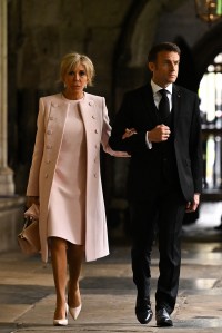 French President Emmanuel Macron and French President's wife Brigitte Macron arrive to take their seats inside Westminster Abbey in central London on May 6, 2023, ahead of the coronations of Britain's King Charles III and Britain's Camilla, Queen Consort. - The set-piece coronation is the first in Britain in 70 years, and only the second in history to be televised. Charles will be the 40th reigning monarch to be crowned at the central London church since King William I in 1066. Outside the UK, he is also king of 14 other Commonwealth countries, including Australia, Canada and New Zealand. Camilla, his second wife, will be crowned queen alongside him, and be known as Queen Camilla after the ceremony. (Photo by Ben Stansall / POOL / AFP) (Photo by BEN STANSALL/POOL/AFP via Getty Images)