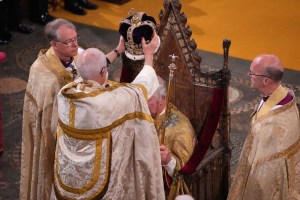 The Archbishop of Canterbury Justin Welby places the St Edward's Crown onto the head of Britain's King Charles III during the Coronation Ceremony inside Westminster Abbey in central London on May 6, 2023. - The set-piece coronation is the first in Britain in 70 years, and only the second in history to be televised. Charles will be the 40th reigning monarch to be crowned at the central London church since King William I in 1066. Outside the UK, he is also king of 14 other Commonwealth countries, including Australia, Canada and New Zealand. Camilla, his second wife, will be crowned queen alongside him and be known as Queen Camilla after the ceremony. (Photo by Aaron Chown / POOL / AFP) (Photo by AARON CHOWN/POOL/AFP via Getty Images)