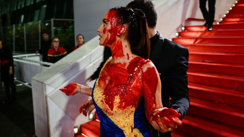 Ilona Chernobai is removed from the red carpet at Cannes Film Festival in Cannes, France, on May 21.