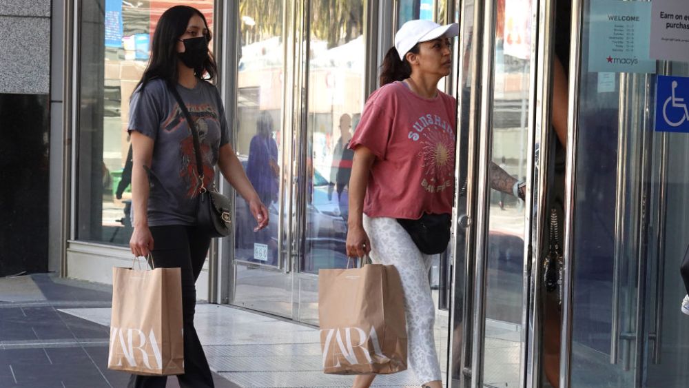 SAN FRANCISCO, CALIFORNIA - APRIL 27: Customers carry shopping bags as they enter a Macy's store on April 27, 2023 in San Francisco, California. U.S. economic growth slowed in the first quarter to 1.1 percent, down from 2.6 percent in the fourth quarter at the end of 2022. (Photo by Justin Sullivan/Getty Images)