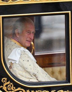 LONDON, ENGLAND - MAY 06: King Charles III and Camilla, Queen Consort travelling in the Diamond Jubilee Coach built in 2012 to commemorate the 60th anniversary of the reign of Queen Elizabeth II, flanked by over a thousand Armed Forces route liners and The Sovereign’s Escort of the Household Cavalry sets off along the Mall from Buckingham Palace on route to Westminster Abbey for the Coronation of King Charles III and Queen Camilla on May 06, 2023 in London, England. The Coronation of Charles III and his wife, Camilla, as King and Queen of the United Kingdom of Great Britain and Northern Ireland, and the other Commonwealth realms takes place at Westminster Abbey today. Charles acceded to the throne on 8 September 2022, upon the death of his mother, Elizabeth II. (Photo by Dan Mullan/Getty Images)