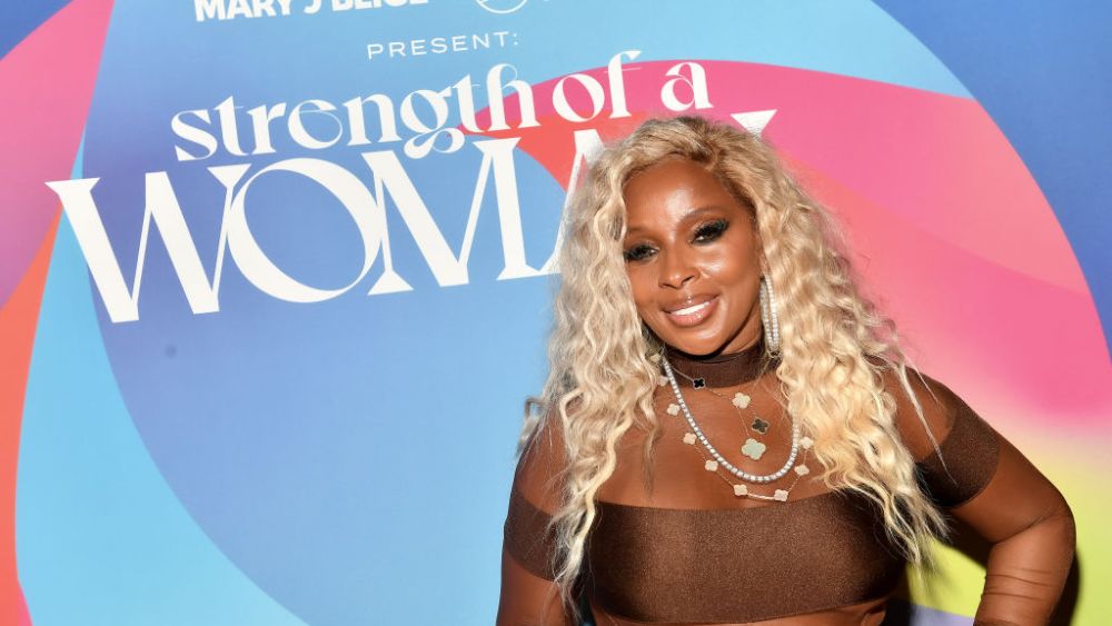 Mary J. Blige in brown mugler bodysuit, sheer, at the Strength of a Woman Festival's “An Evening with Robert Glasper” on May 11 in Atlanta.