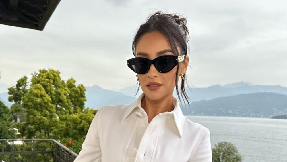 Attending Louis Vuitton's Cruise Show with Shay Mitchell