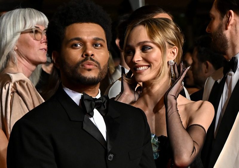 the weeknd, Tesfaye, and Lily-Rose Depp at "The Idol" red carpet on May 22 in Cannes, France.