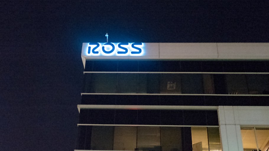 Facade with logo and sign at night at headquarters of Ross Stores in the San Francisco Bay Area, Dublin, California, March 5, 2018.