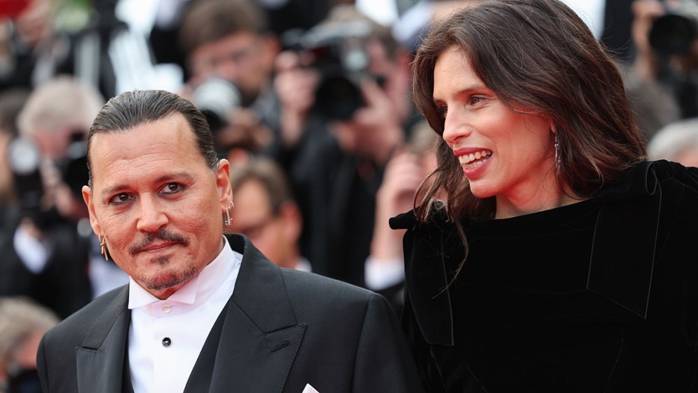 CANNES, FRANCE - MAY 16: Johnny Depp and Ma√Øwenn attend the "Jeanne du Barry" Screening & opening ceremony red carpet at the 76th annual Cannes film festival at Palais des Festivals on May 16, 2023 in Cannes, France. (Photo by Vittorio Zunino Celotto/Getty Images)