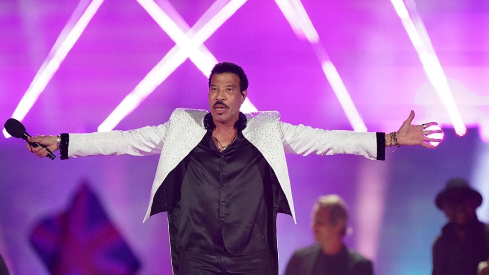 WINDSOR, ENGLAND - MAY 07:   Lionel Richie performs during the Coronation Concert in the grounds of Windsor Castle on May 7, 2023 in Windsor, England. The Windsor Castle Concert is part of the celebrations of the Coronation of Charles III and his wife, Camilla, as King and Queen of the United Kingdom of Great Britain and Northern Ireland, and the other Commonwealth realms that took place at Westminster Abbey yesterday. High-profile performers will entertain members of the royal family and 20,000 guests including 10,000 members of the public. (Photo by Yui Mok - WPA Pool/Getty Images)