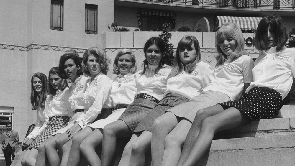 A group of debutantes outside the Dorchester Hotel, London, where they are training to take part in the launch of a new petrol brand from European Petroleum, 31st May 1966. (Photo by Chris Ware/Keystone/Hulton Archive/Getty Images)