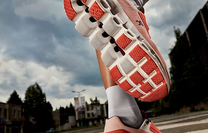 On's Cloudstratus sneaker in Rose Red.