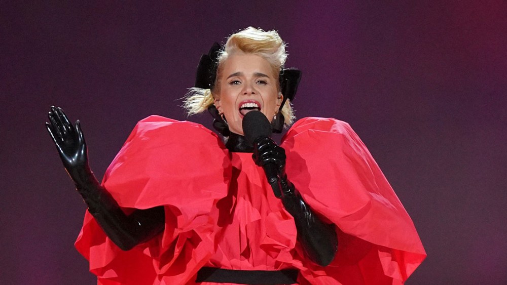 WINDSOR, ENGLAND - MAY 07:   Paloma Faith performs in roksanda red dress during the Coronation Concert in the grounds of Windsor Castle on May 7, 2023 in Windsor, England. The Windsor Castle Concert is part of the celebrations of the Coronation of Charles III and his wife, Camilla, as King and Queen of the United Kingdom of Great Britain and Northern Ireland, and the other Commonwealth realms that took place at Westminster Abbey yesterday. High-profile performers will entertain members of the royal family and 20,000 guests including 10,000 members of the public. (Photo by Yui Mok - WPA Pool/Getty Images)