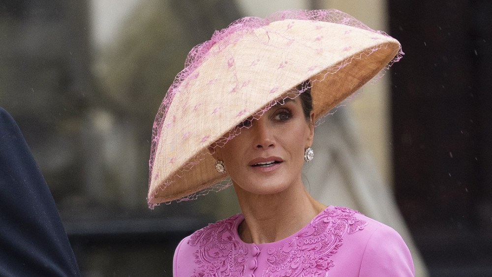 LONDON, ENGLAND - MAY 6: King Felipe of Spain and Queen Letizia  wearing pink carolina herrera suit dress and hat of Spain at Westminster Abbey during the Coronation of King Charles III and Queen Camilla on May 6, 2023 in London, England. The Coronation of Charles III and his wife, Camilla, as King and Queen of the United Kingdom of Great Britain and Northern Ireland, and the other Commonwealth realms takes place at Westminster Abbey today. Charles acceded to the throne on 8 September 2022, upon the death of his mother, Elizabeth II. (Photo by Mark Cuthbert/UK Press via Getty Images)